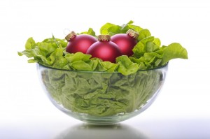 A Bowl With Fresh Salad And Three Red Christmas Balls 300×199